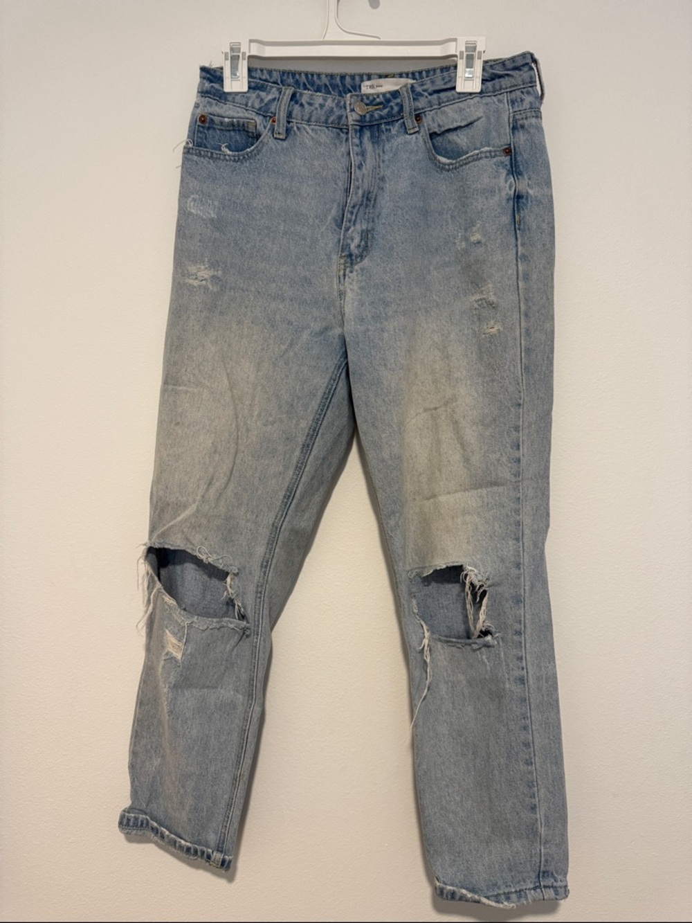 Relaxed Light Blue Distressed Boyfriend Jeans for Women